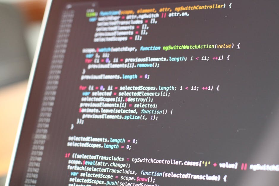 A close-up view of a computer screen displaying colorful lines of code, with syntax highlighting in shades of pink, green, blue, and white. The code appears to be JavaScript, featuring functions, loop
